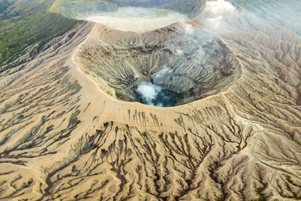 volcano-crater-expelling-smoke