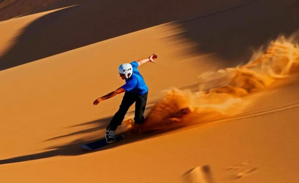 Thrilling Tourist Spots: 15 Mind-Blowing Destinations Built for Pure Adrenaline 13 Thrilling Tourist Spots - Sahara Desert Dune Surfing, Morocco